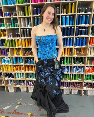 Who knew old workwear could be used so creatively?’ Fashion student creates glam dress from recycled uniforms