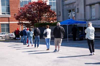 US private payrolls post first drop in more than two years; layoffs still low