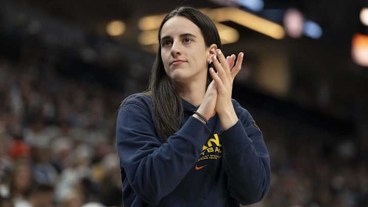 Injured Caitlin Clark celebrates as bartender for Fever’s Commissioner’s Cup trophy